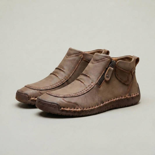 PLUXSTYLE::numise::mens-side-zip-stitched-ankle-footwear::closeup-detail