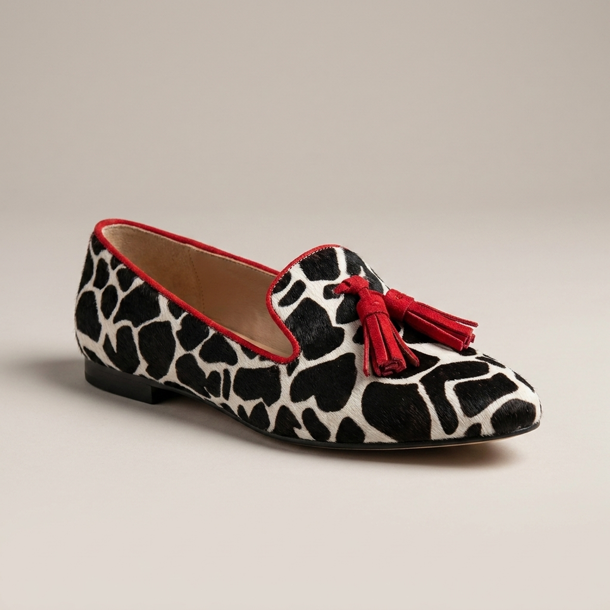 PLUXSTYLE::numise::animal-print-loafers-with-red-trim::closeup-hero