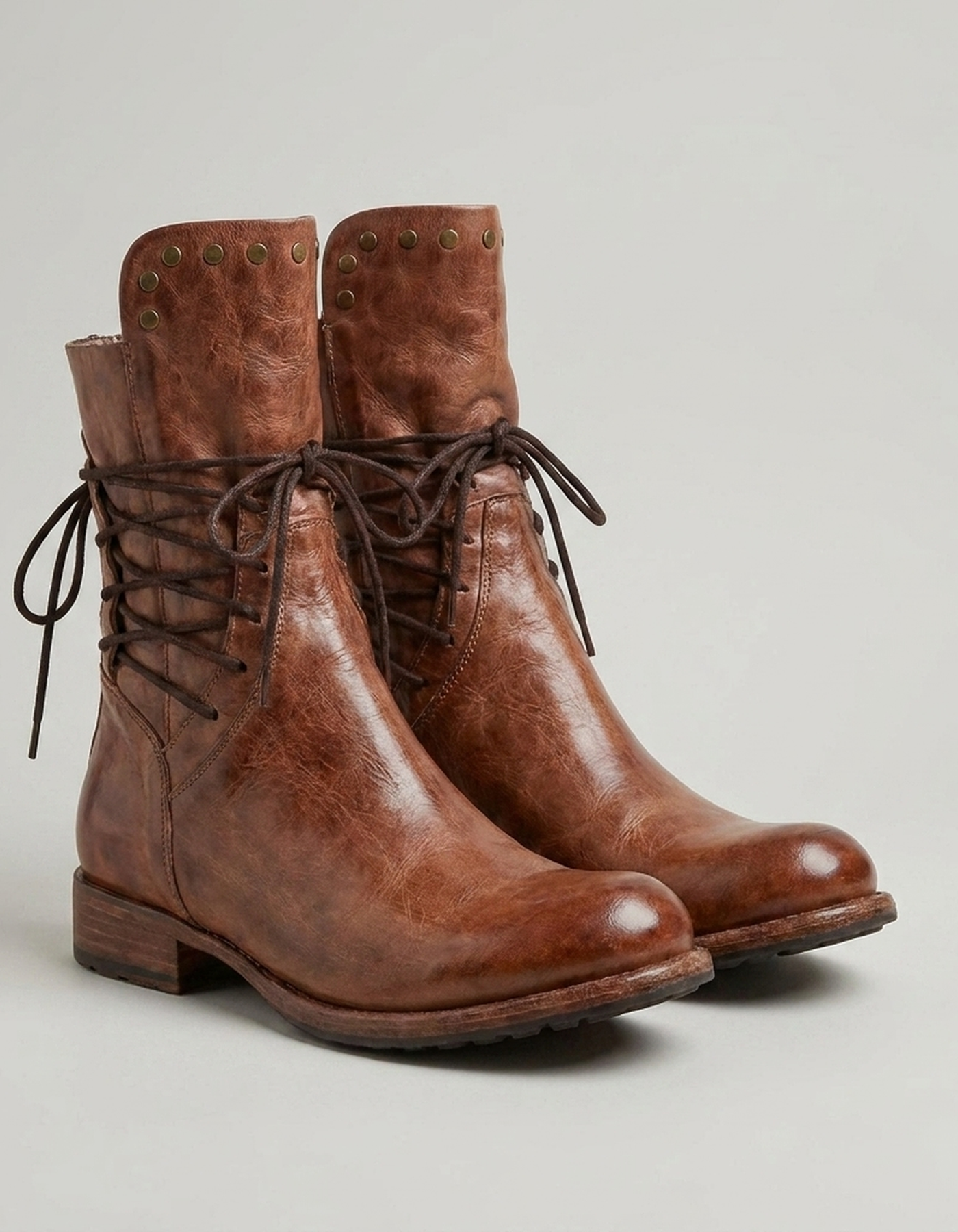 PLUXSTYLE::numise::studded-lace-up-ankle-boots::closeup-detail