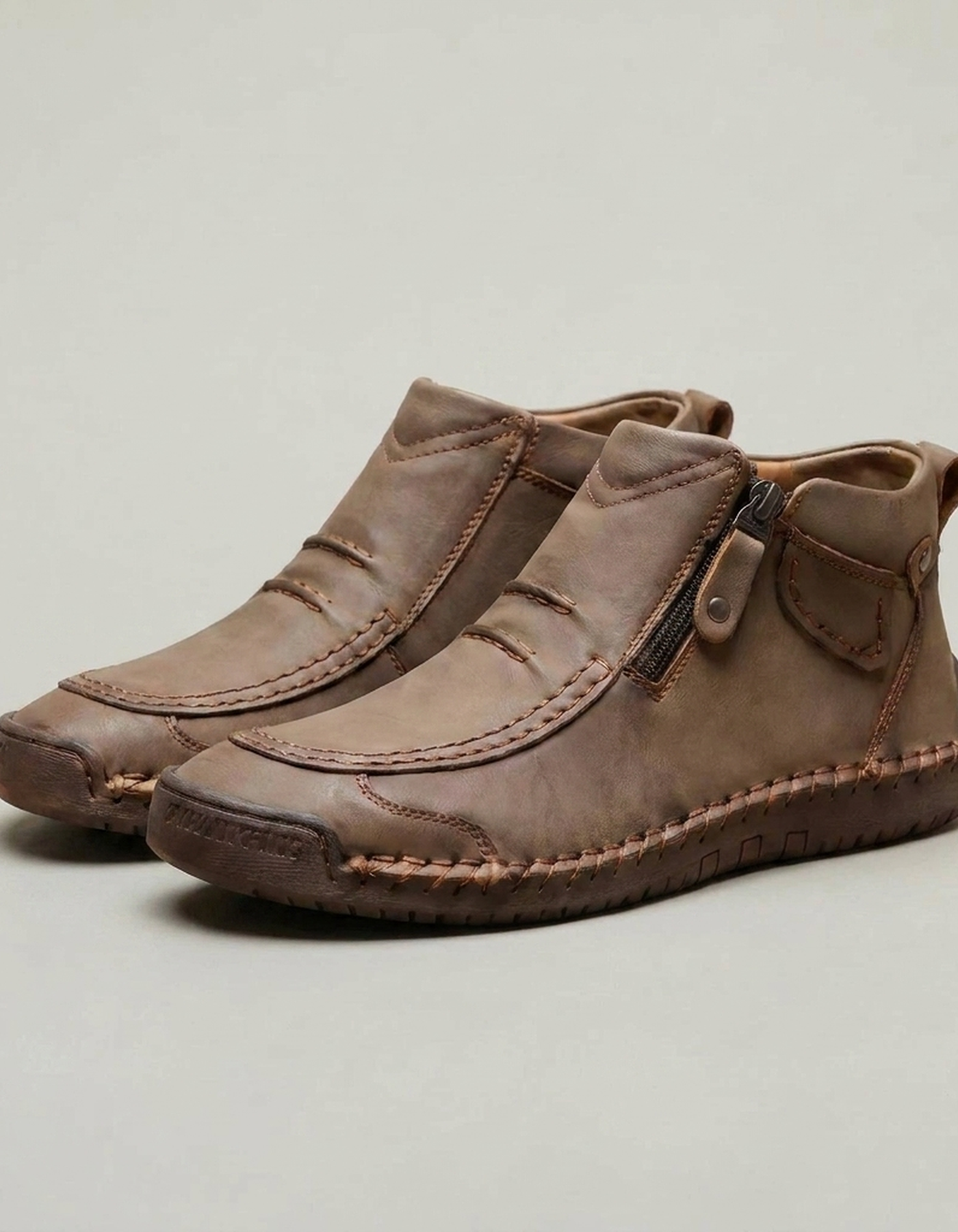 PLUXSTYLE::numise::mens-side-zip-stitched-ankle-footwear::closeup-detail