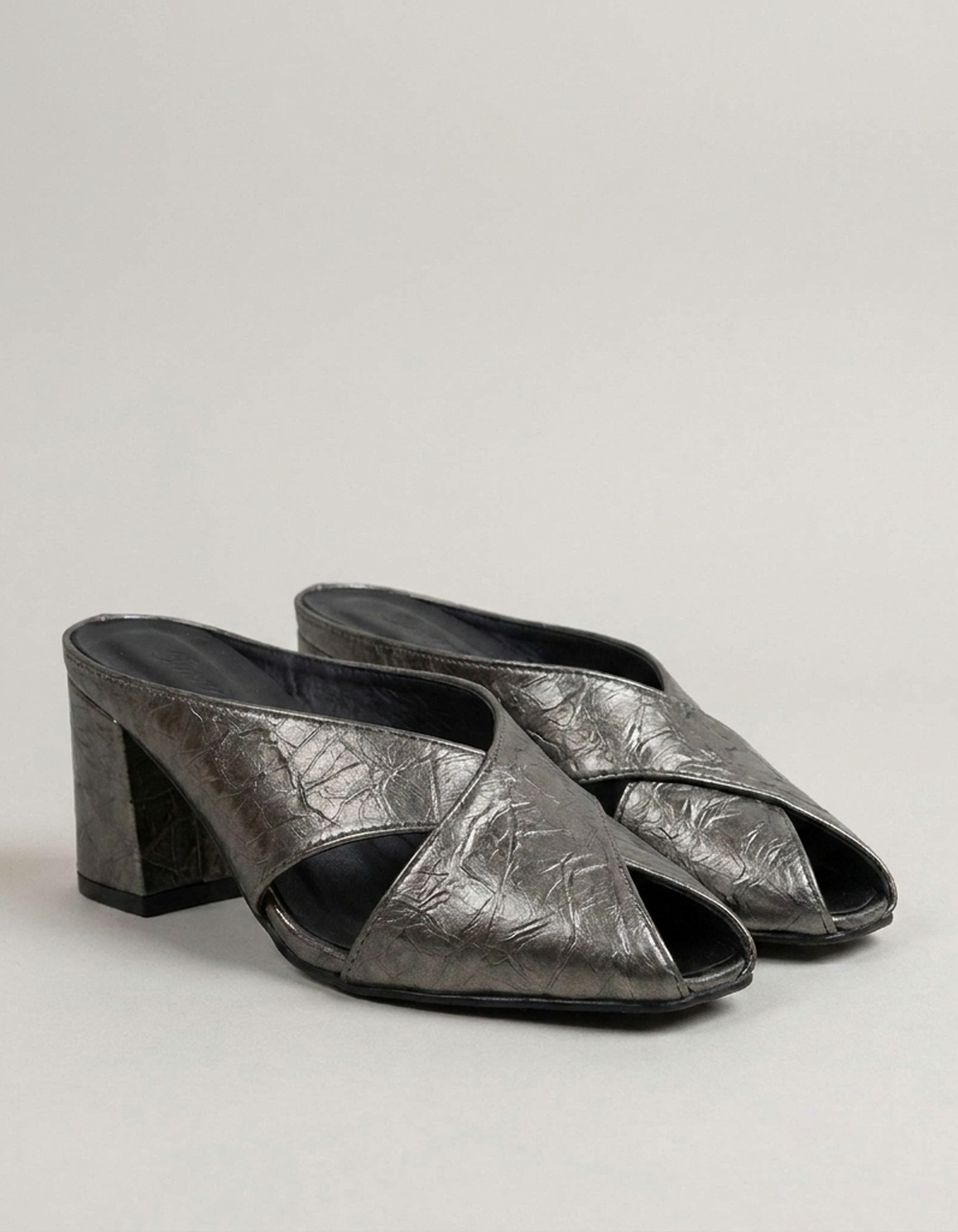 PLUXSTYLE::numise::womens-square-toe-cross-strap-mules::closeup-detail