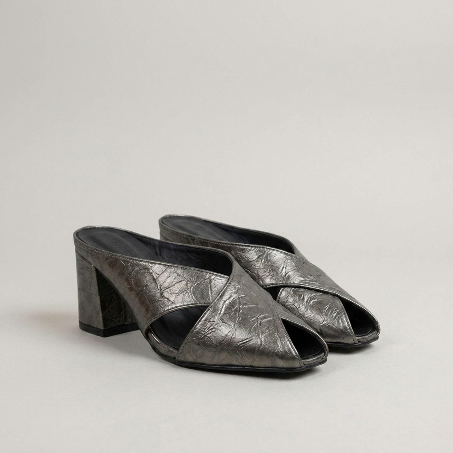 PLUXSTYLE::numise::womens-square-toe-cross-strap-mules::closeup-detail