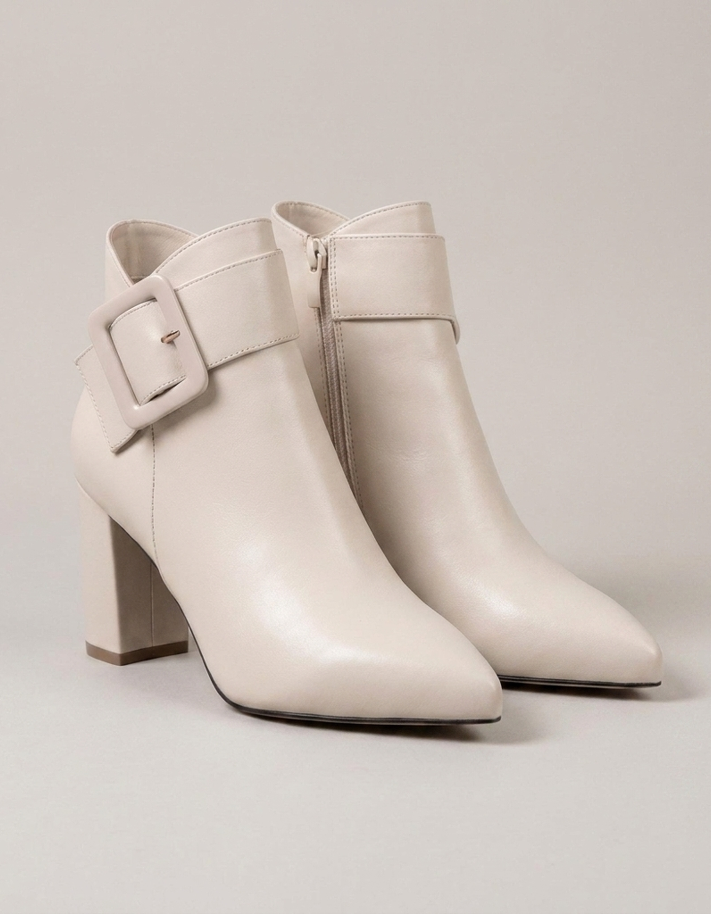 PLUXSTYLE::numise::buckle-side-zip-ankle-boots::closeup-detail