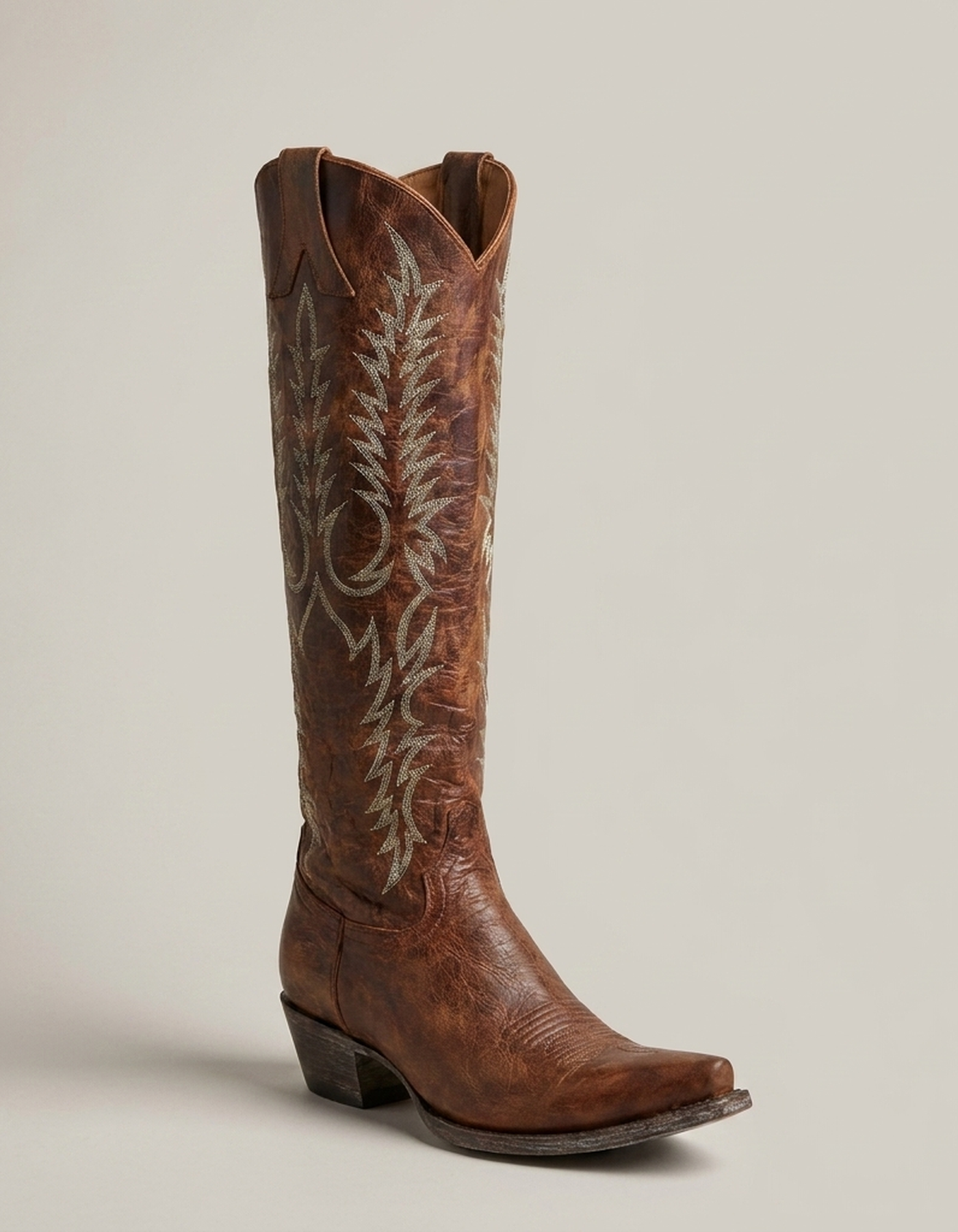 PLUXSTYLE::numise::embroidered-western-knee-high-boots::closeup-hero