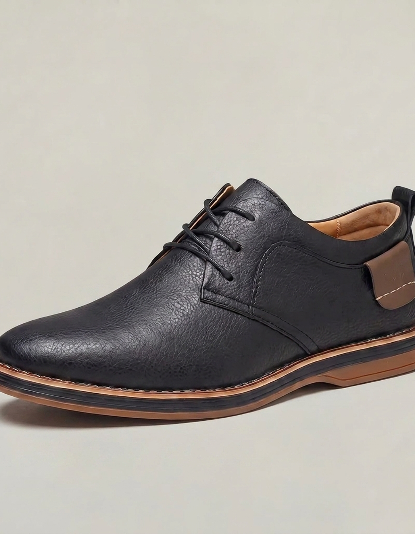 PLUXSTYLE::numise::mens-comfort-fit-textured-dress-shoes::closeup-hero