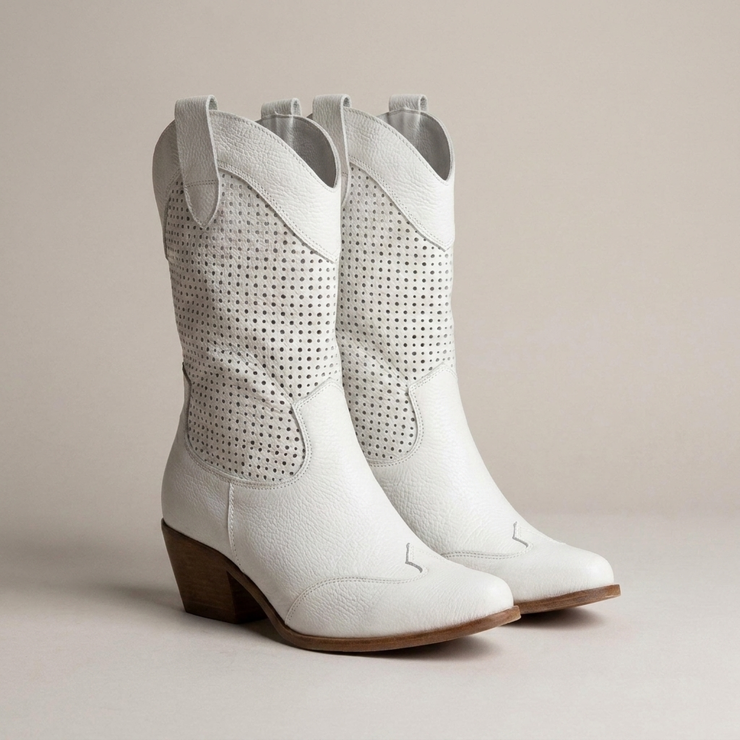 PLUXSTYLE::numise::amelia-perforated-cowboy-boots::closeup-detail