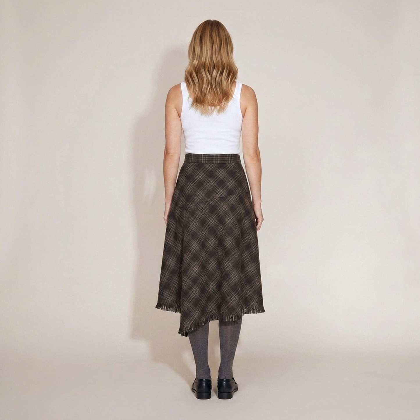 PLUXSTYLE::numise::annie-asymmetric-plaid-fringe-skirt::back