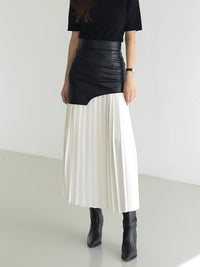 PLUXSTYLE::numise::asymmetric-pleated-midi-skirt::lifestyle-keep-1