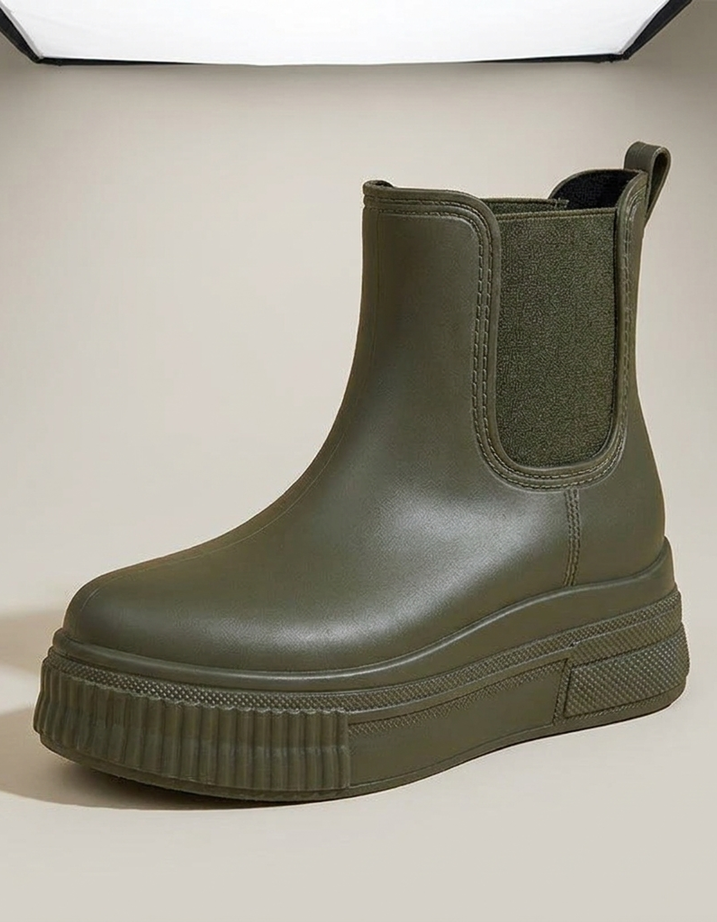 PLUXSTYLE::numise::olivia-platform-rain-boots::closeup-hero