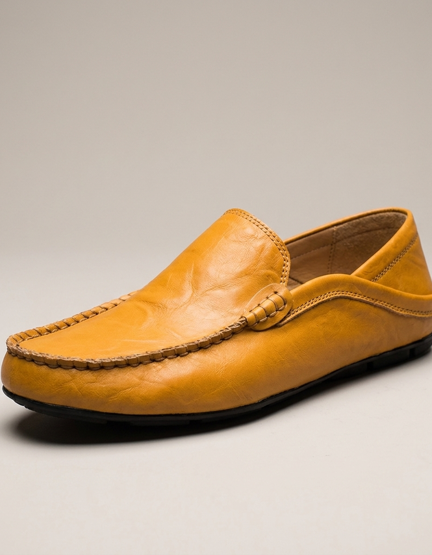 PLUXSTYLE::numise::mens-contrast-stitch-penny-loafers-1::closeup-hero