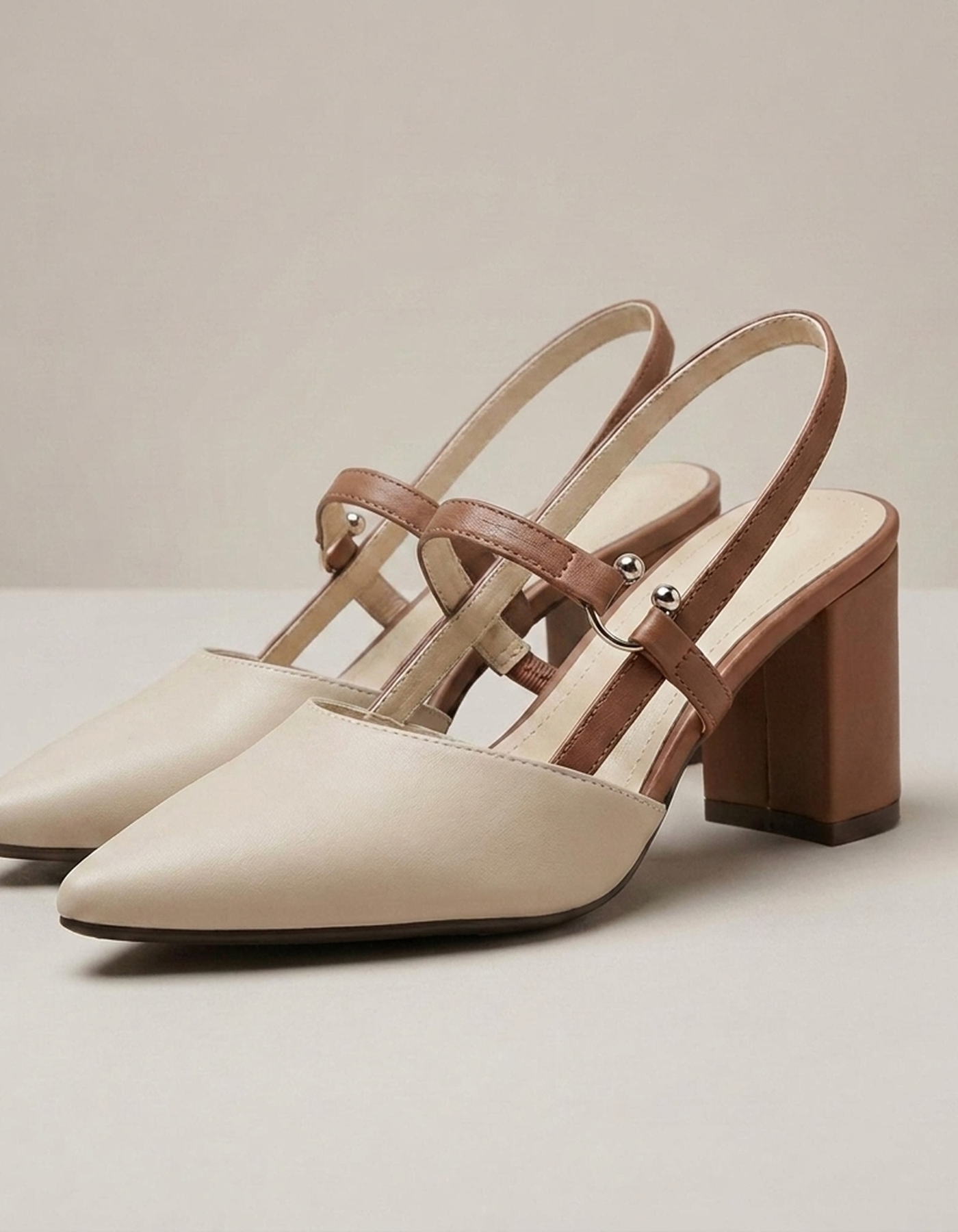 PLUXSTYLE::numise::pointed-toe-slingback-footwear::closeup-detail