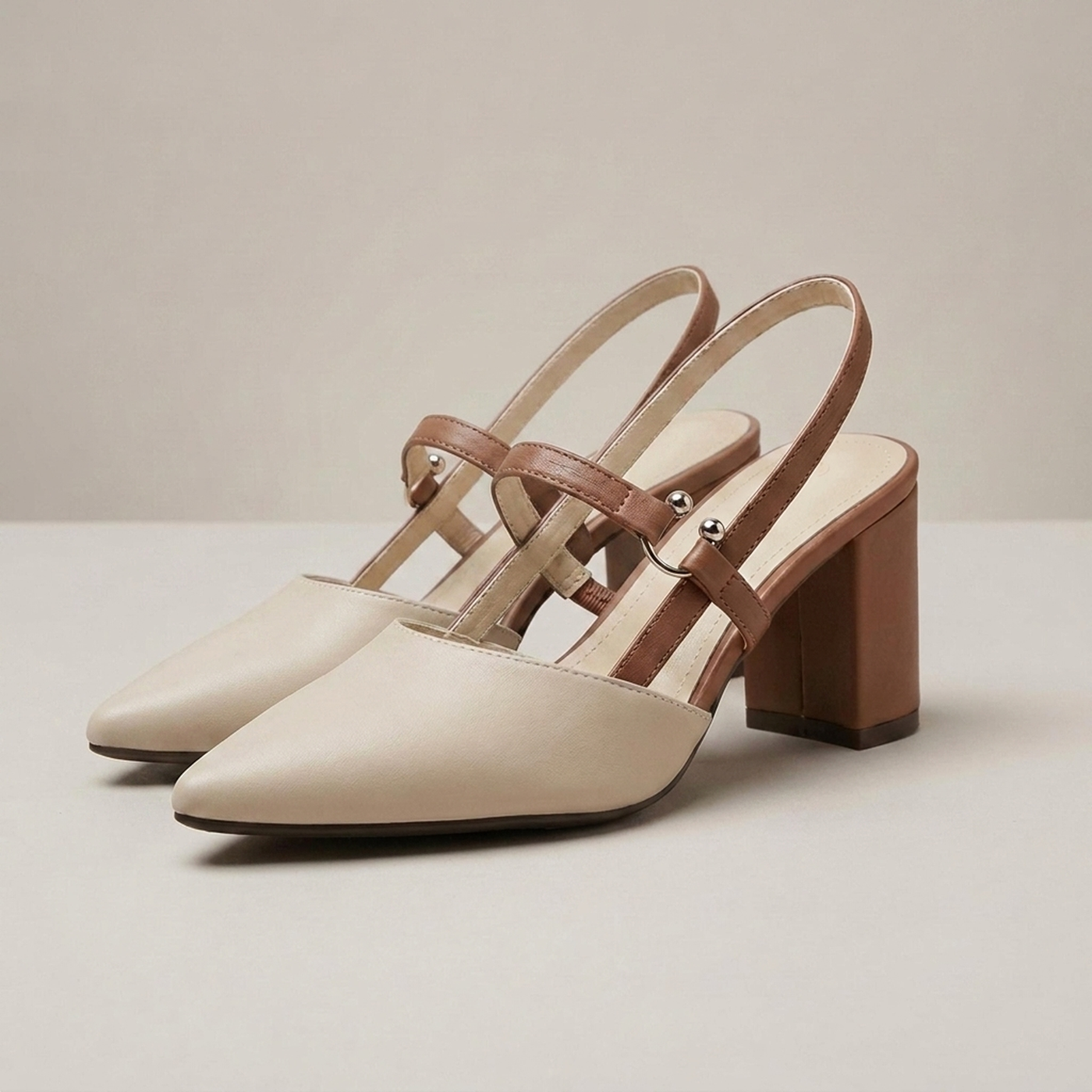 PLUXSTYLE::numise::pointed-toe-slingback-footwear::closeup-detail