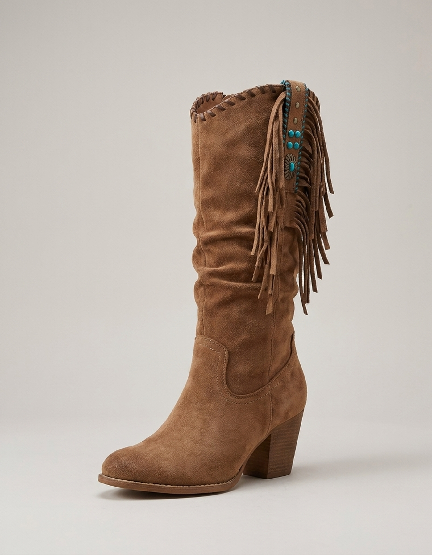PLUXSTYLE::numise::womens-fringe-cowboy-boots::closeup-hero
