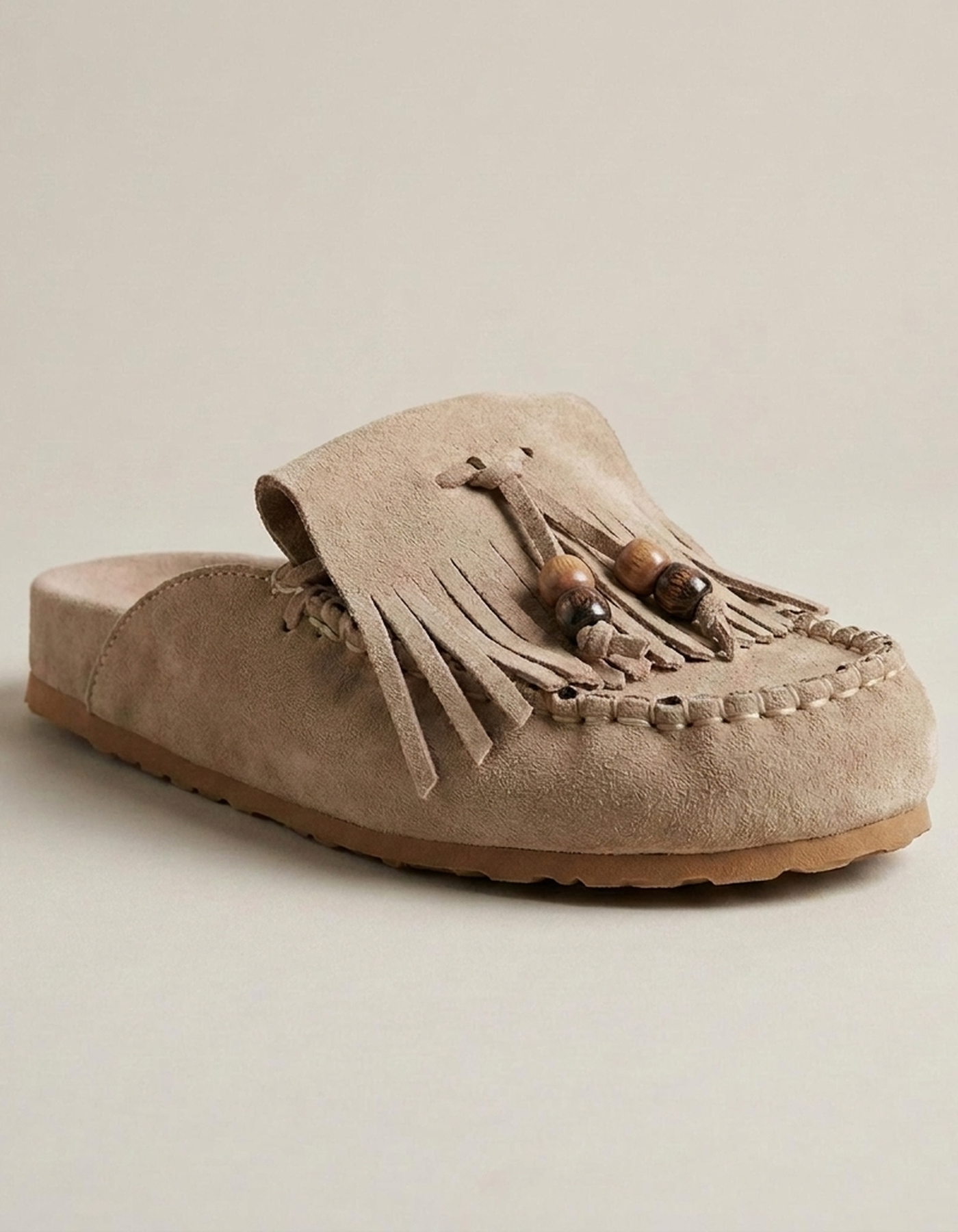 PLUXSTYLE::numise::joan-open-back-taupe-mules::closeup-detail