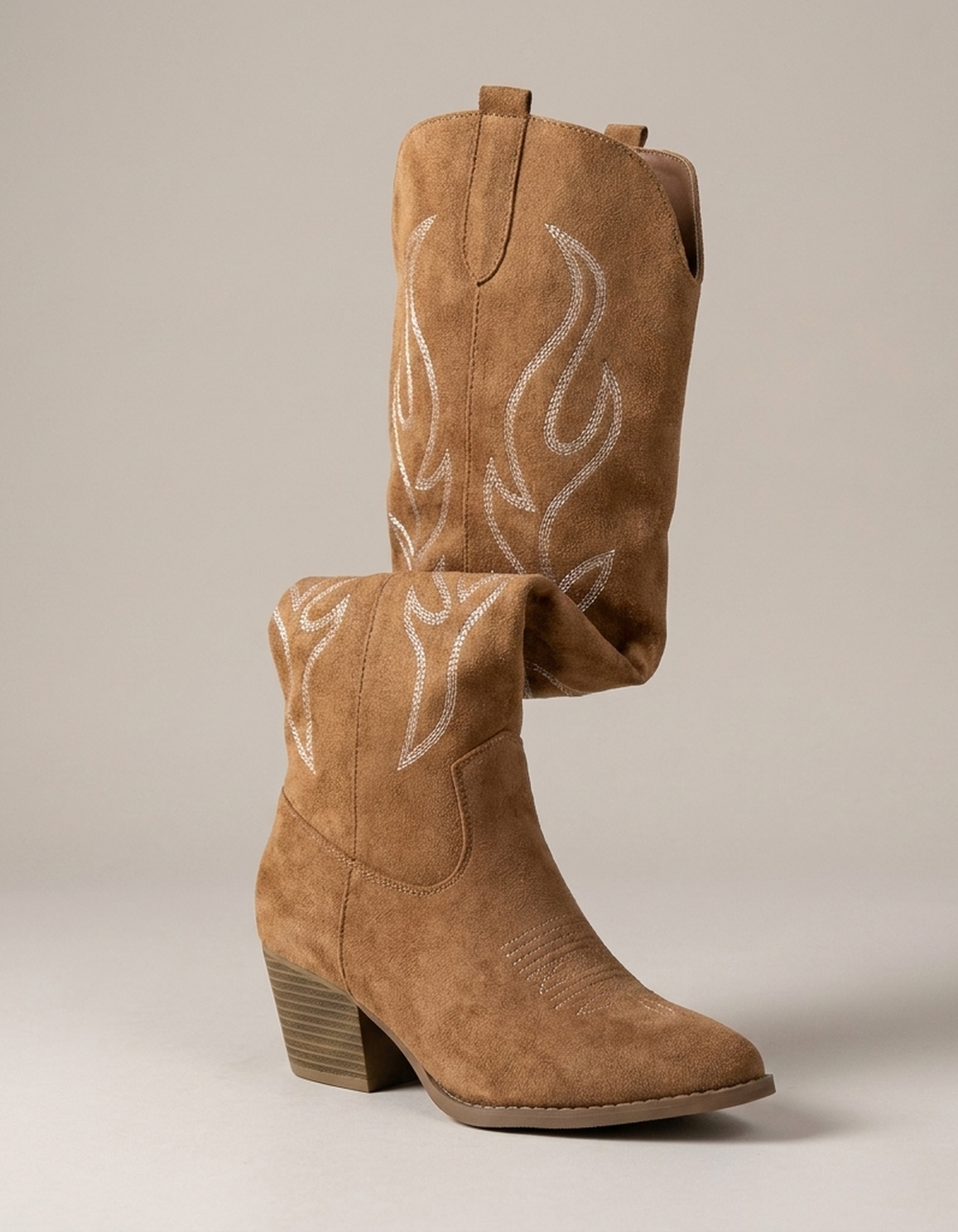 PLUXSTYLE::numise::poppy-heeled-knee-high-cowboy-boots::closeup-hero