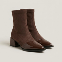 PLUXSTYLE::numise::gloss-detail-block-heel-ankle-boots::closeup-detail