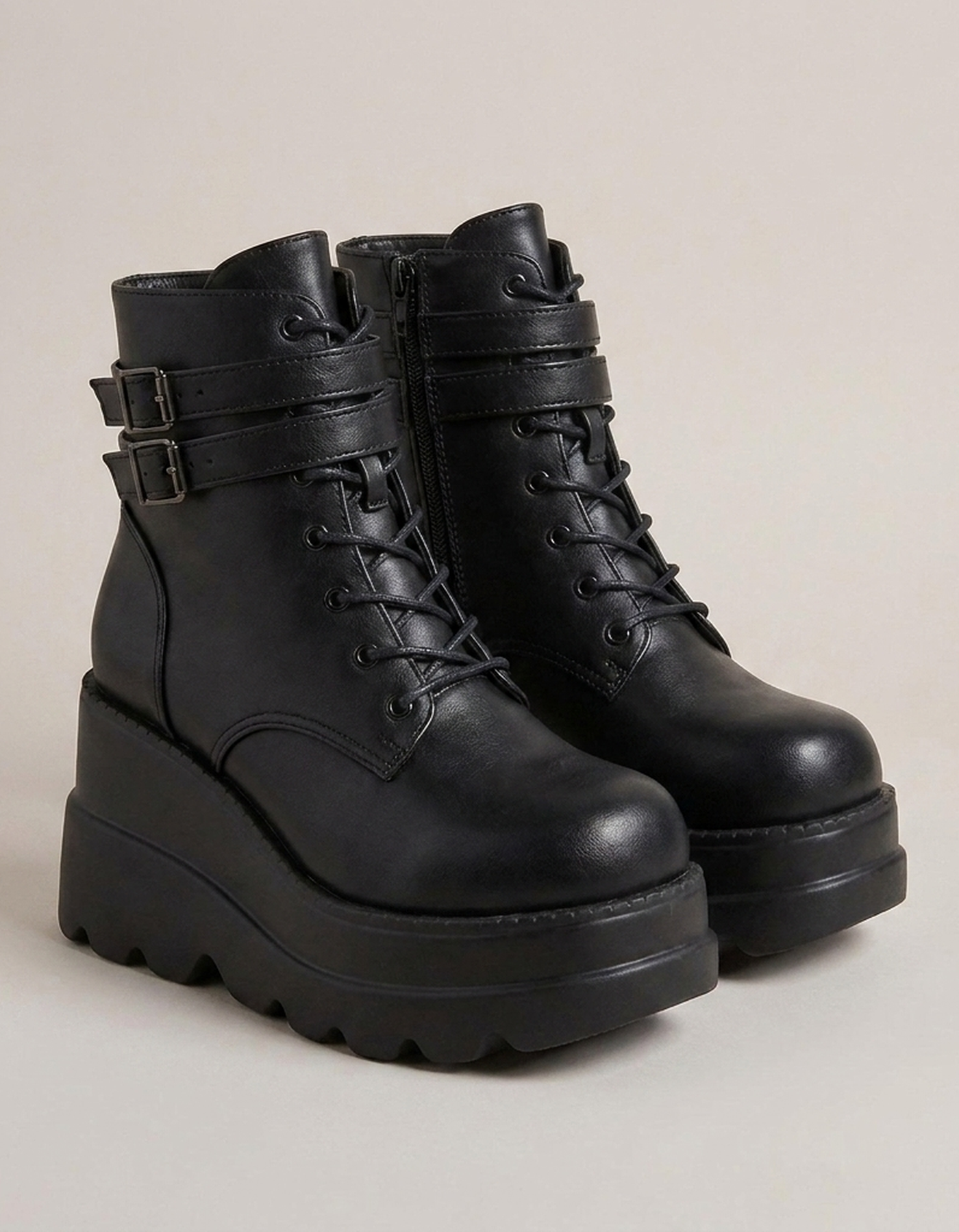 PLUXSTYLE::numise::studded-platform-combat-boots::closeup-detail
