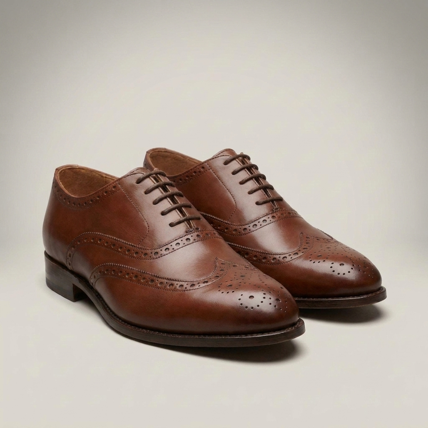 PLUXSTYLE::numise::adam-brogue-dress-shoes::closeup-detail