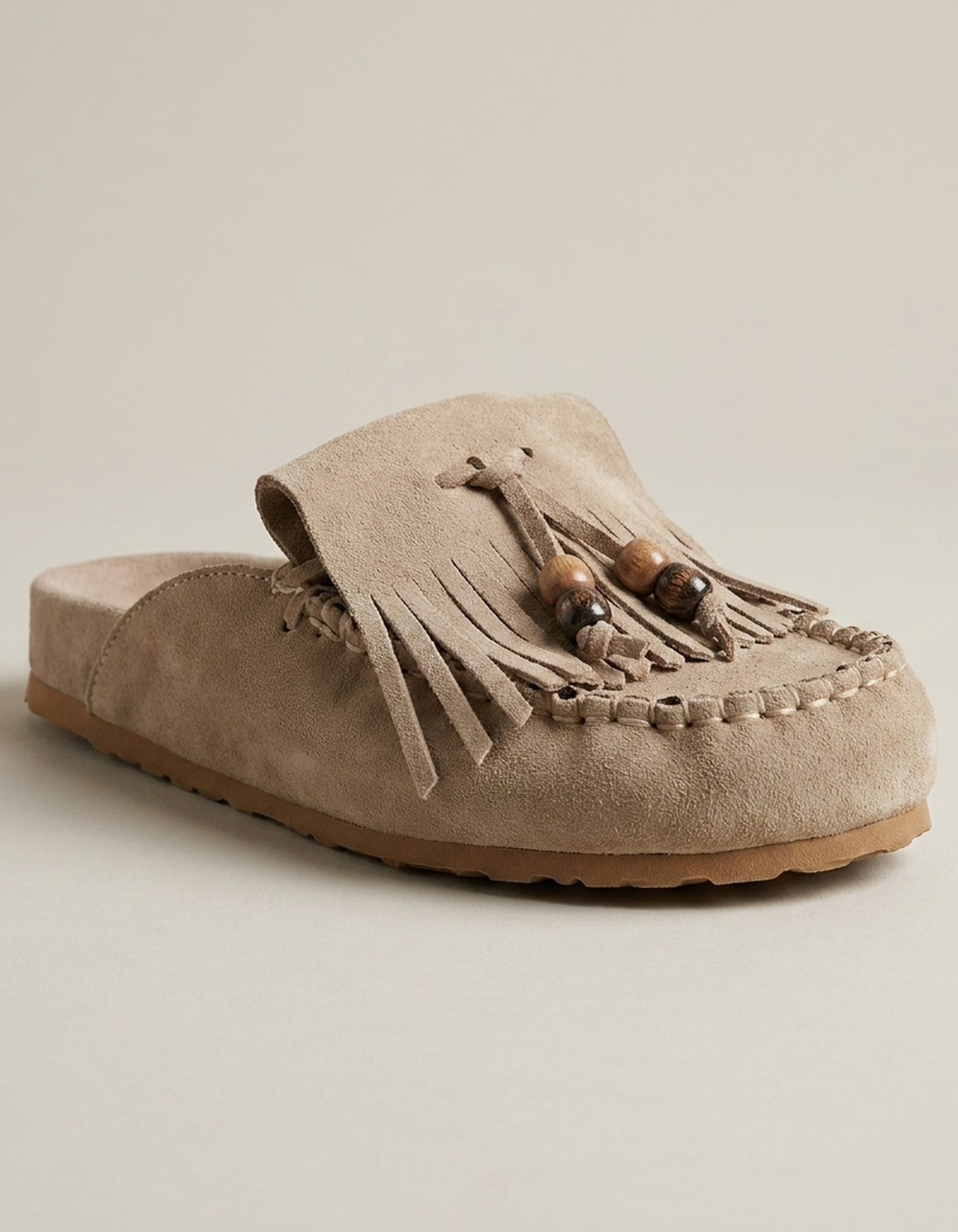 PLUXSTYLE::numise::joan-open-back-taupe-mules::closeup-hero
