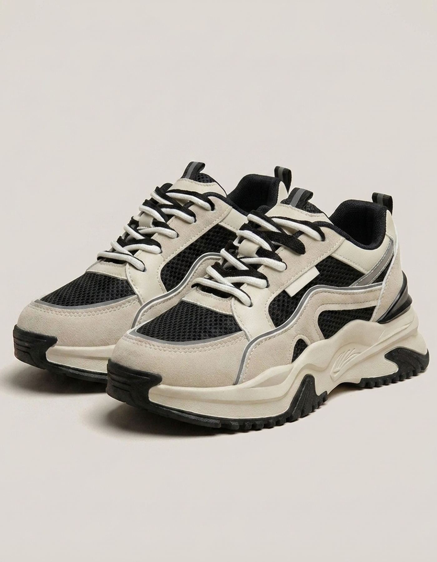 PLUXSTYLE::numise::paneled-chunky-platform-sneakers::closeup-detail