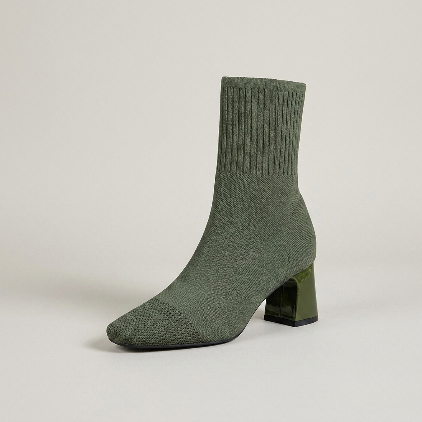 PLUXSTYLE::numise::pointed-toe-slip-on-ankle-boots::closeup-hero