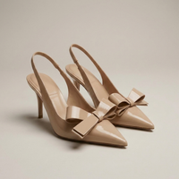 PLUXSTYLE::numise::pointed-toe-bow-slingback-table::closeup-detail