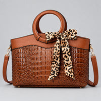 Refined Round-Handle Handbag
