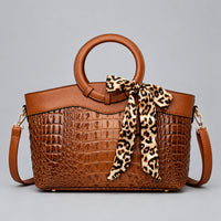 Refined Round-Handle Handbag