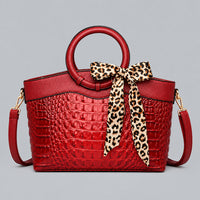 Refined Round-Handle Handbag