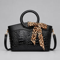 Refined Round-Handle Handbag