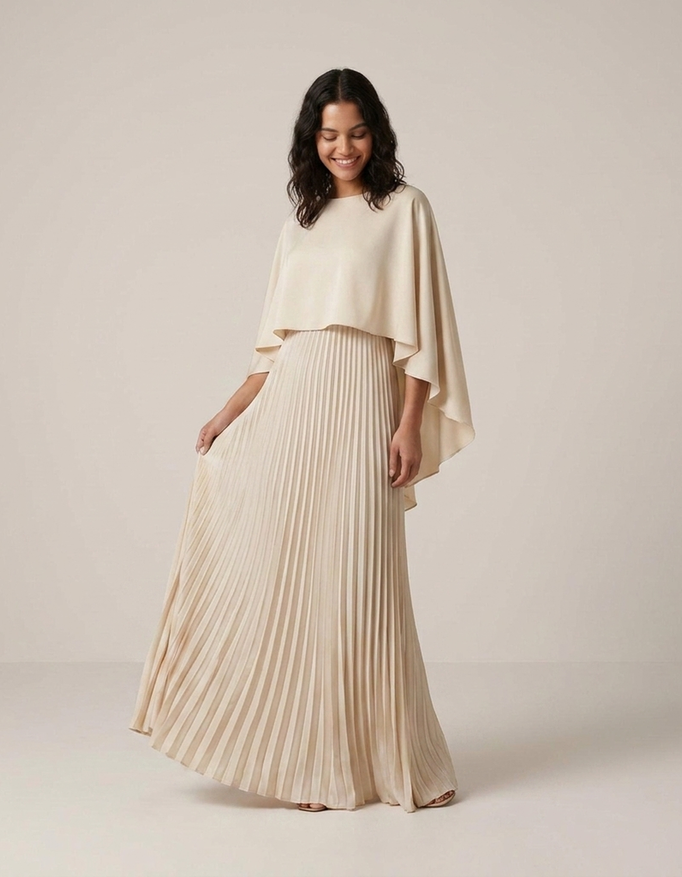 PLUXSTYLE::numise::alicia-pleated-cape-maxi-dress::front-v2