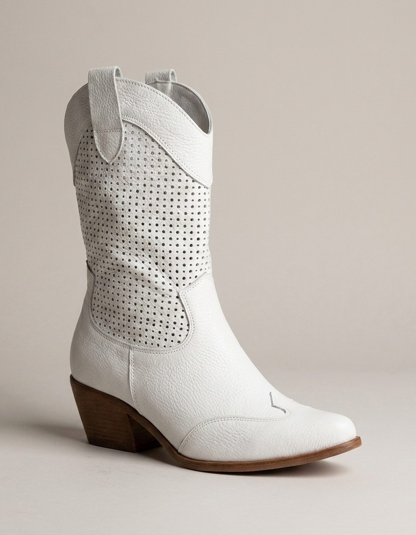 PLUXSTYLE::numise::amelia-perforated-cowboy-boots::closeup-hero