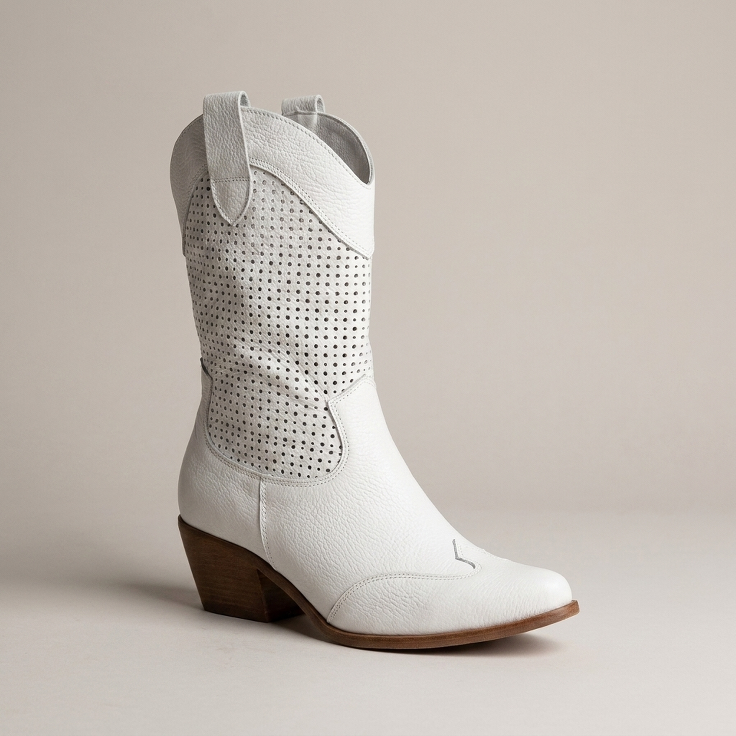 PLUXSTYLE::numise::amelia-perforated-cowboy-boots::closeup-hero