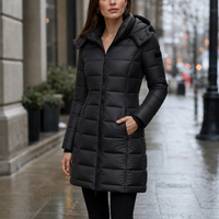 Jenna | Chaqueta acolchada con capucha de largo medio para invierno para mujer