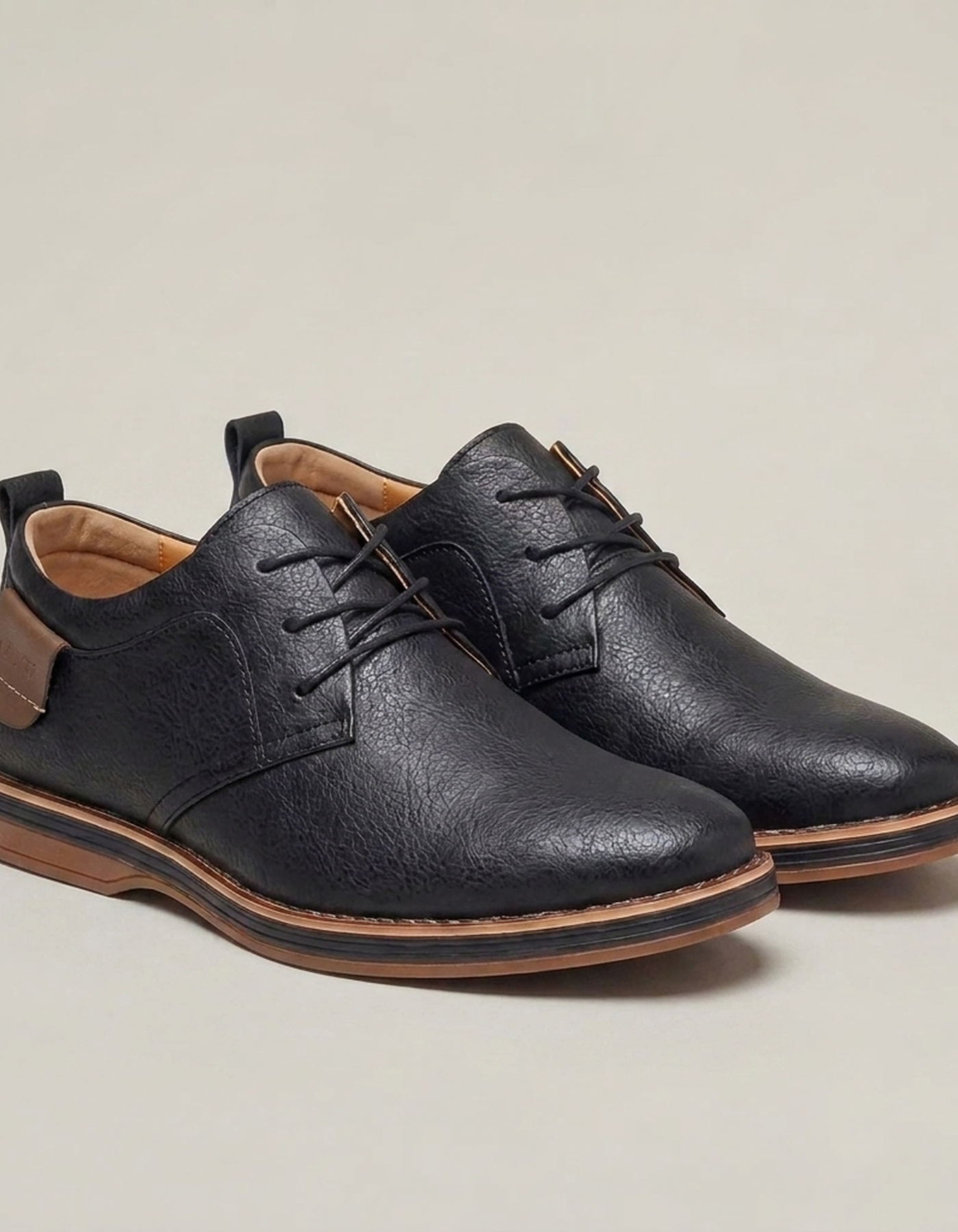 PLUXSTYLE::numise::mens-comfort-fit-textured-dress-shoes::closeup-detail
