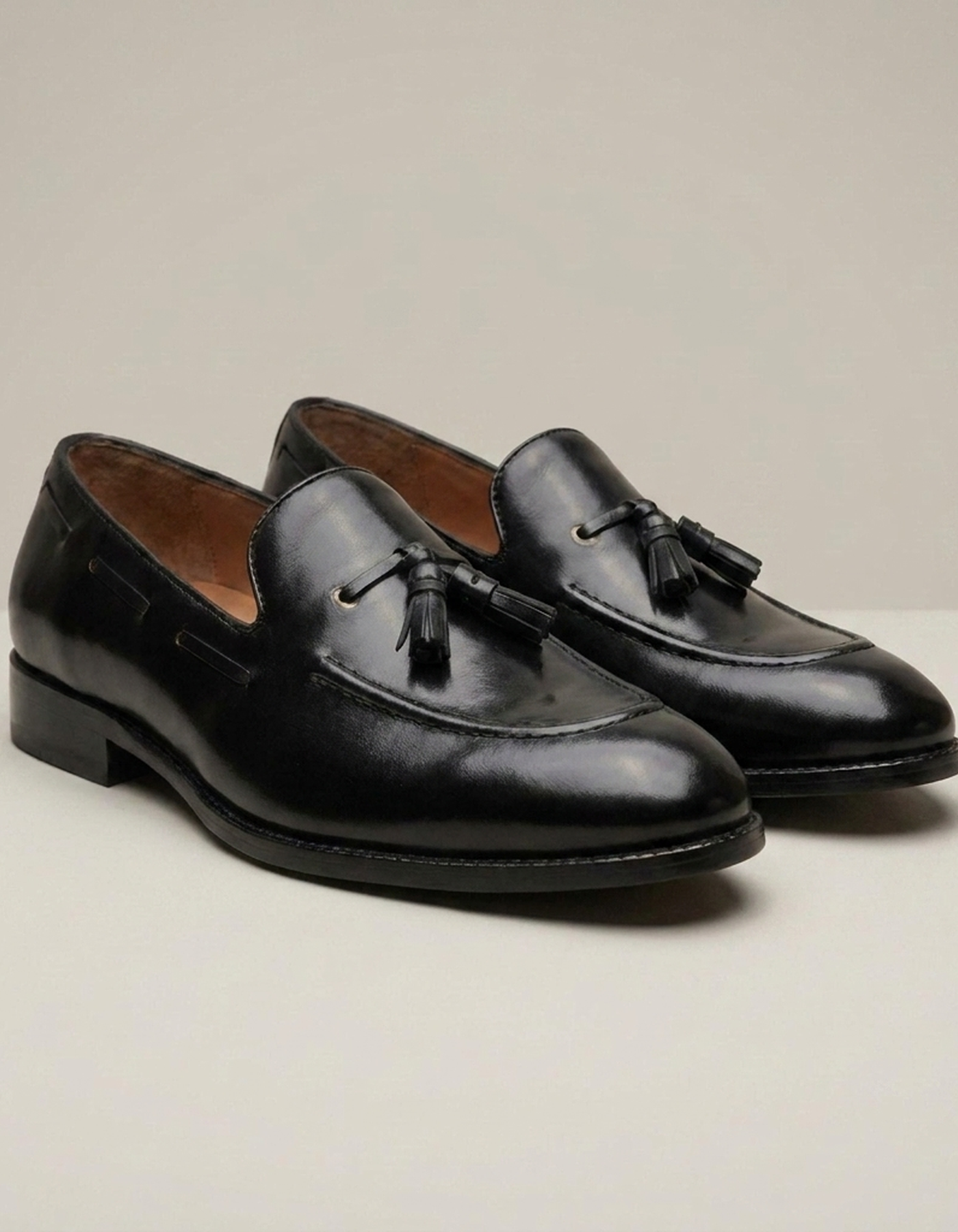 PLUXSTYLE::numise::adam-black-tassel-loafers::closeup-detail