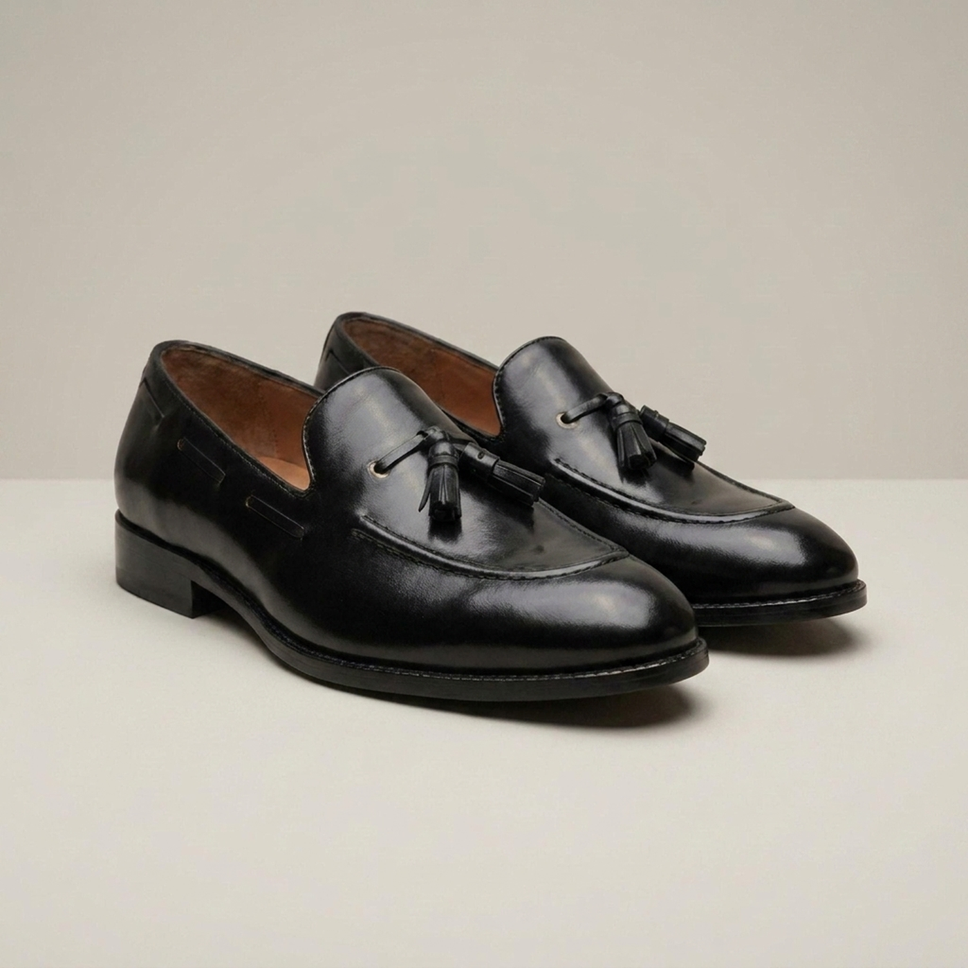 PLUXSTYLE::numise::adam-black-tassel-loafers::closeup-detail