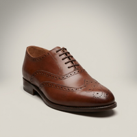 PLUXSTYLE::numise::adam-brogue-dress-shoes::closeup-hero