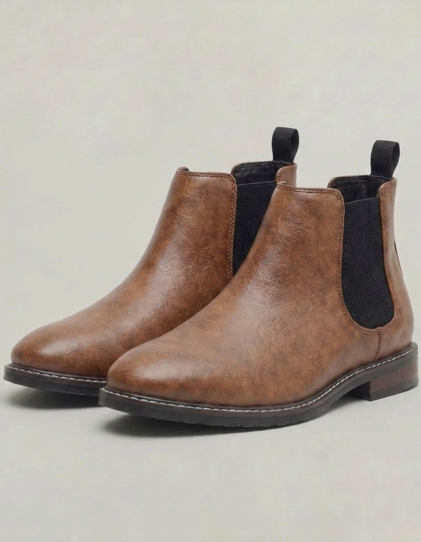 PLUXSTYLE::numise::saddle-brown-chelsea-boots::closeup-detail