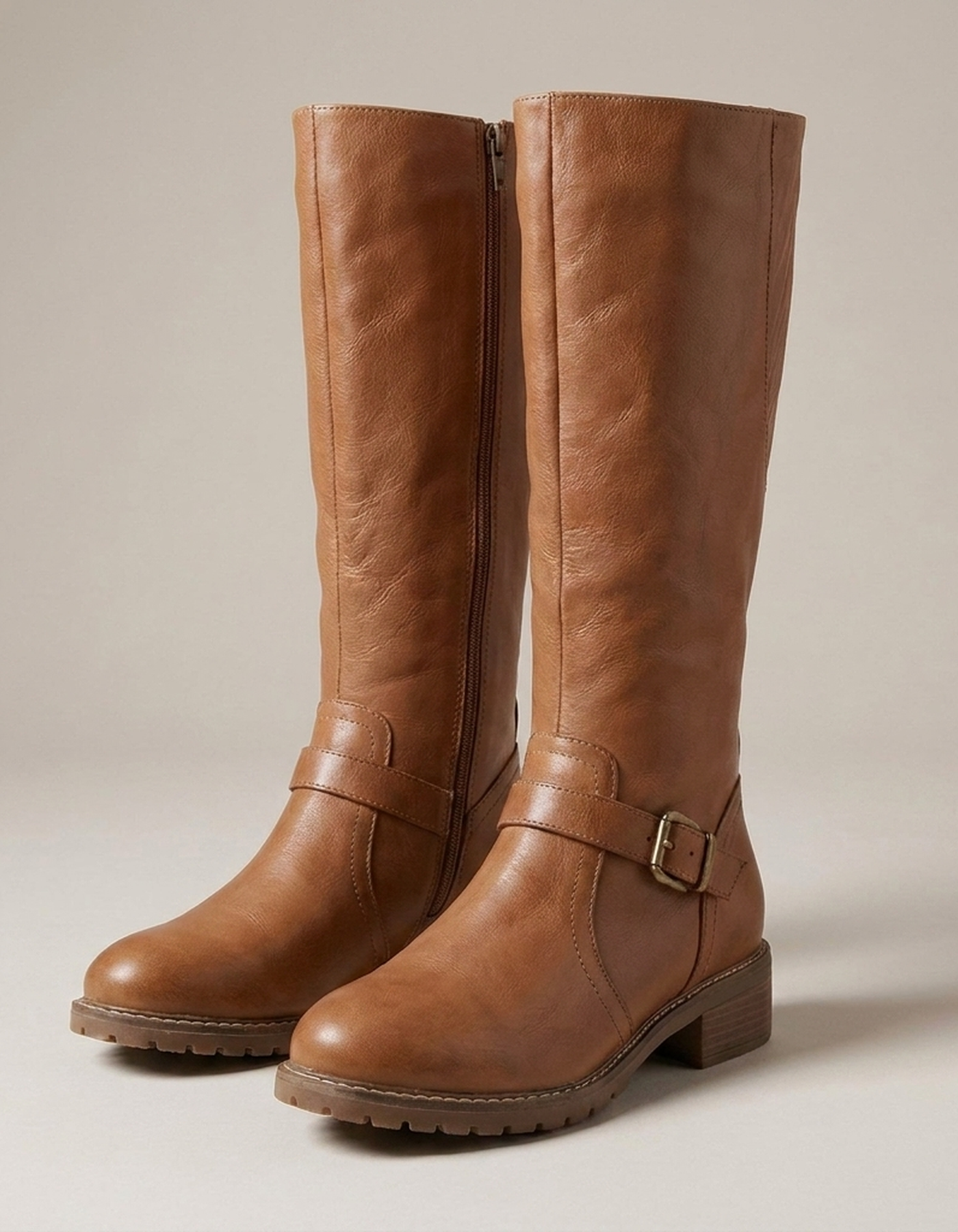 PLUXSTYLE::numise::supportive-buckle-tall-boots::closeup-detail
