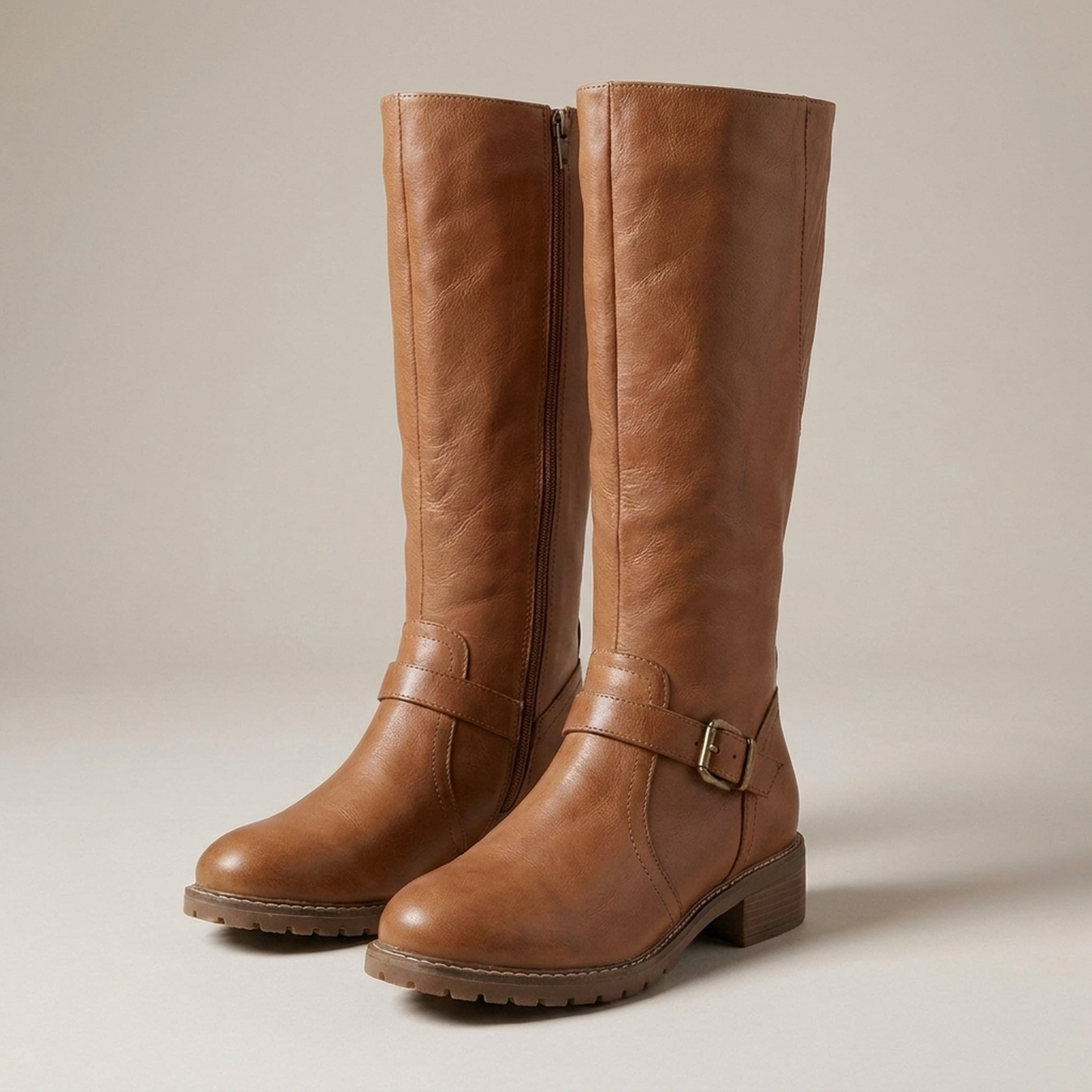 PLUXSTYLE::numise::supportive-buckle-tall-boots::closeup-detail