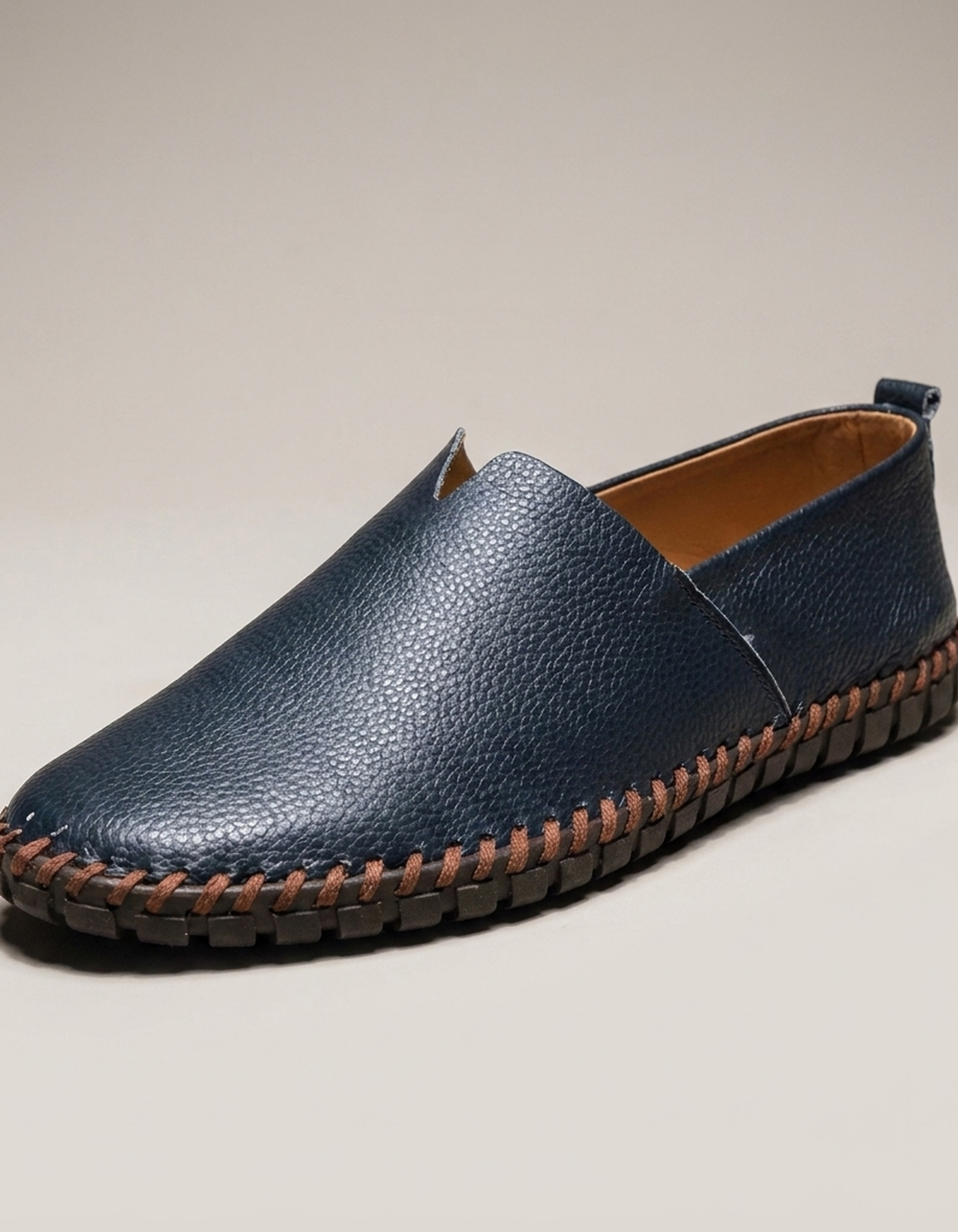 PLUXSTYLE::numise::mens-whipstitch-loafers::closeup-hero