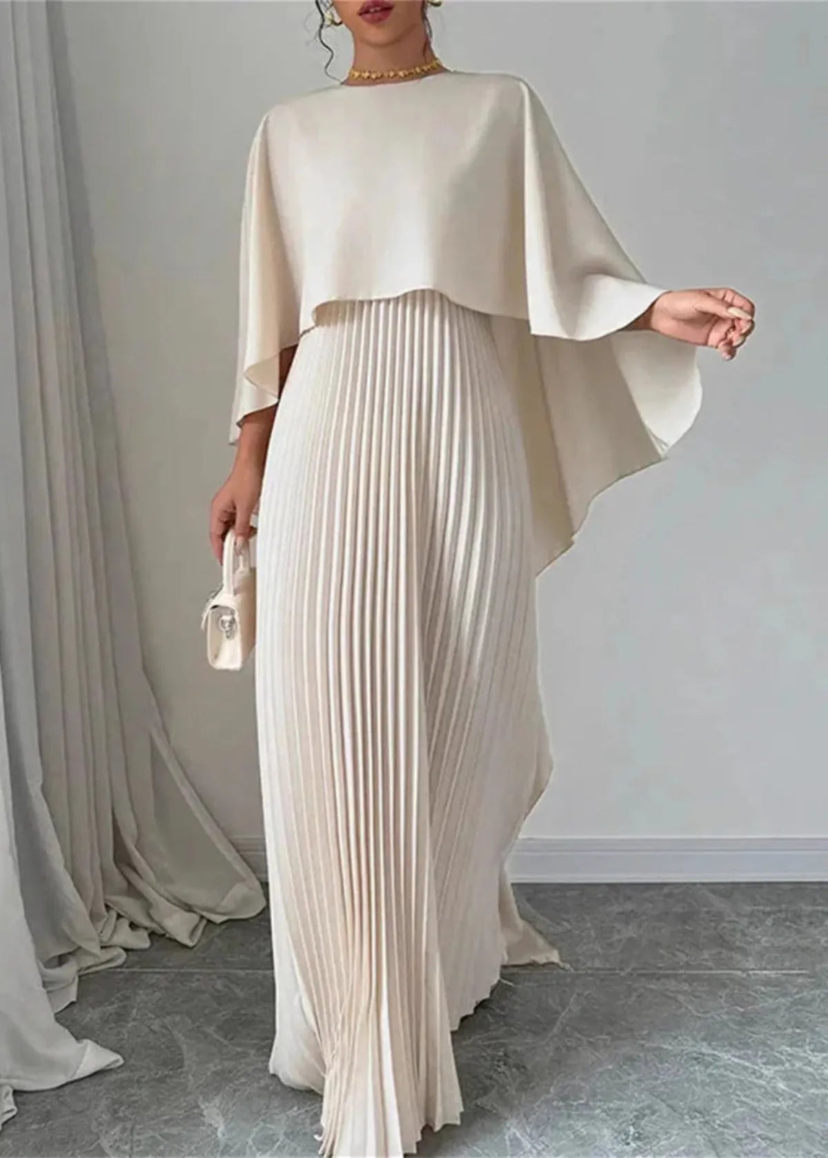 PLUXSTYLE::numise::alicia-pleated-cape-maxi-dress::lifestyle-keep-1