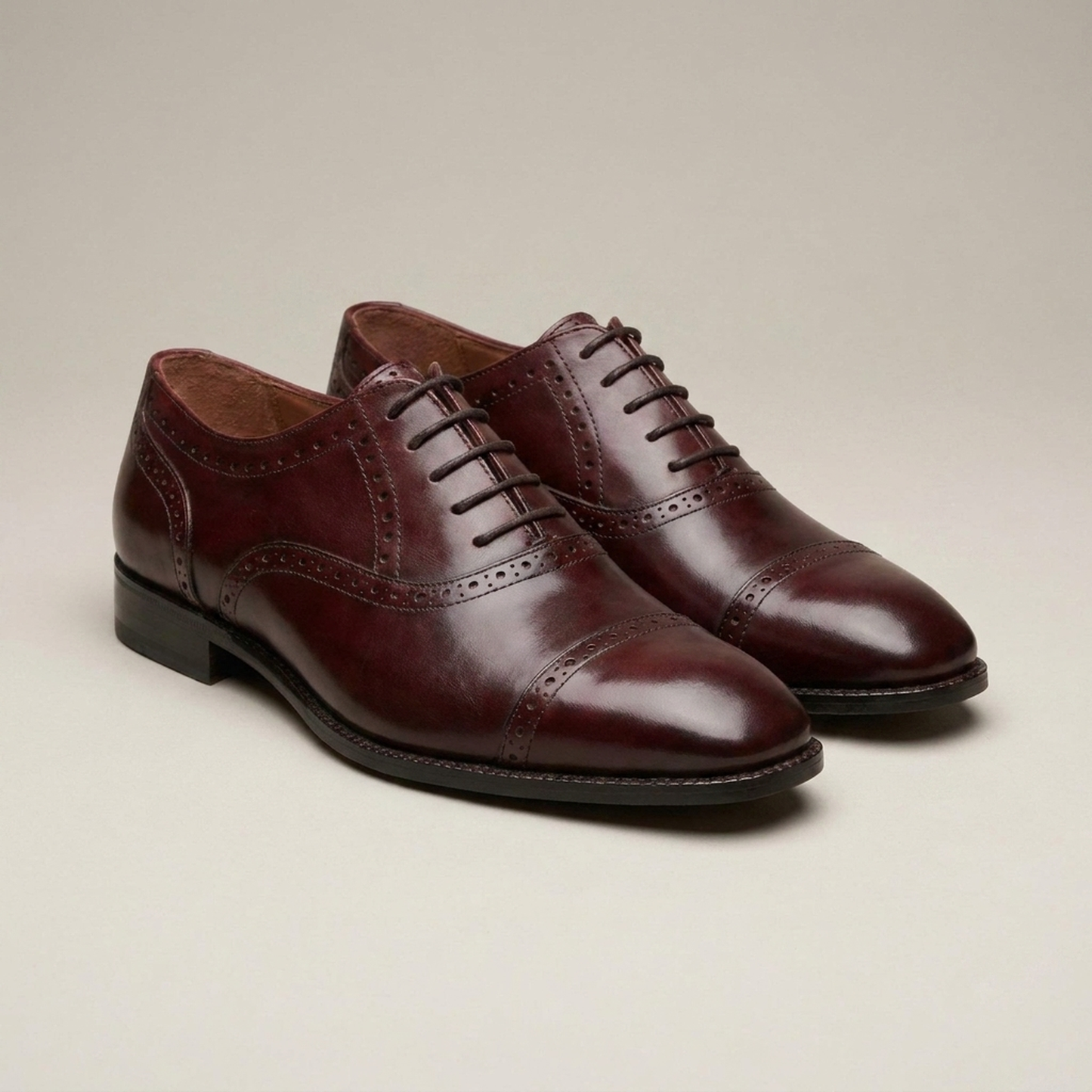PLUXSTYLE::numise::mens-oxblood-oxford-dress-shoes::closeup-detail