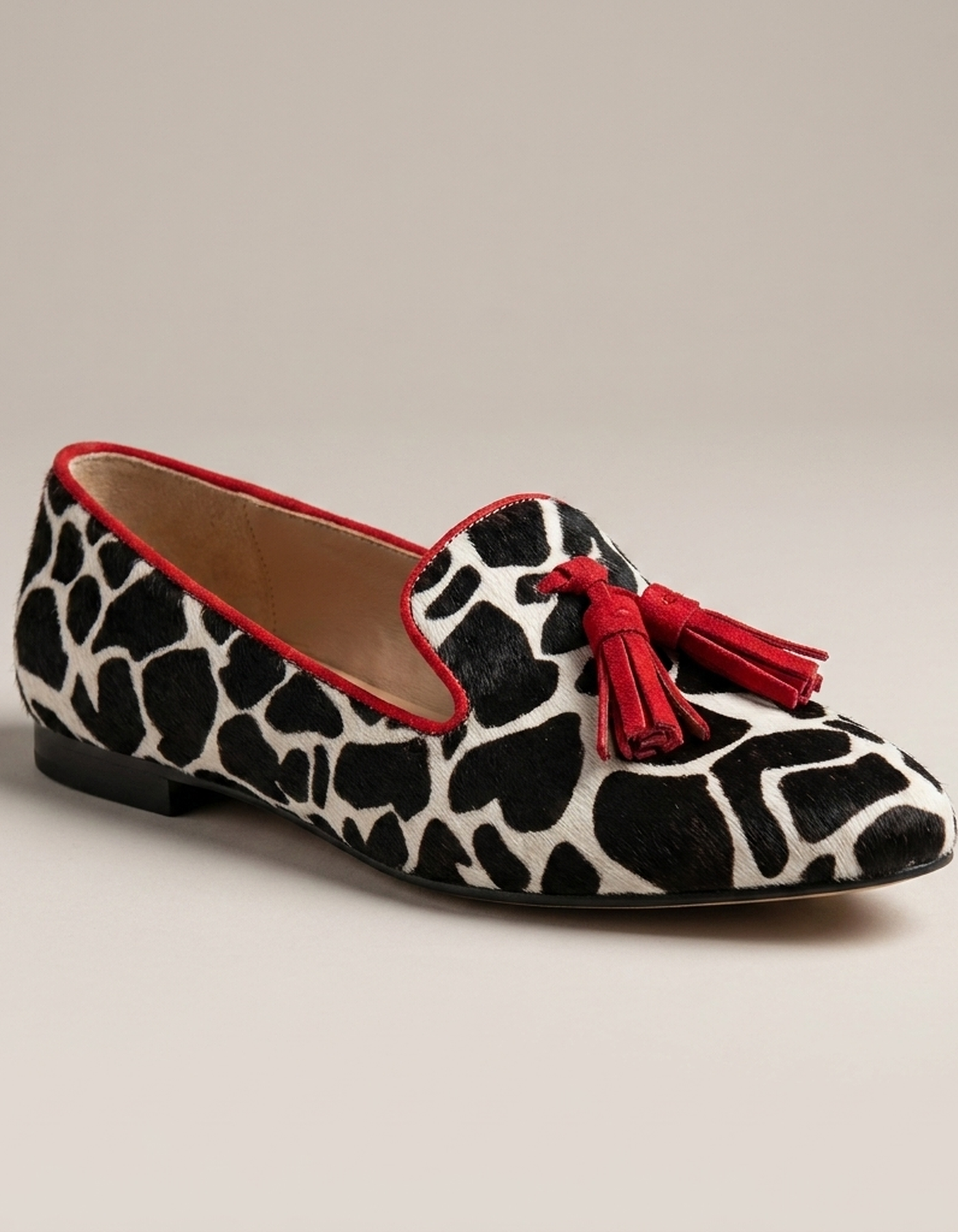 PLUXSTYLE::numise::animal-print-loafers-with-red-trim::closeup-hero
