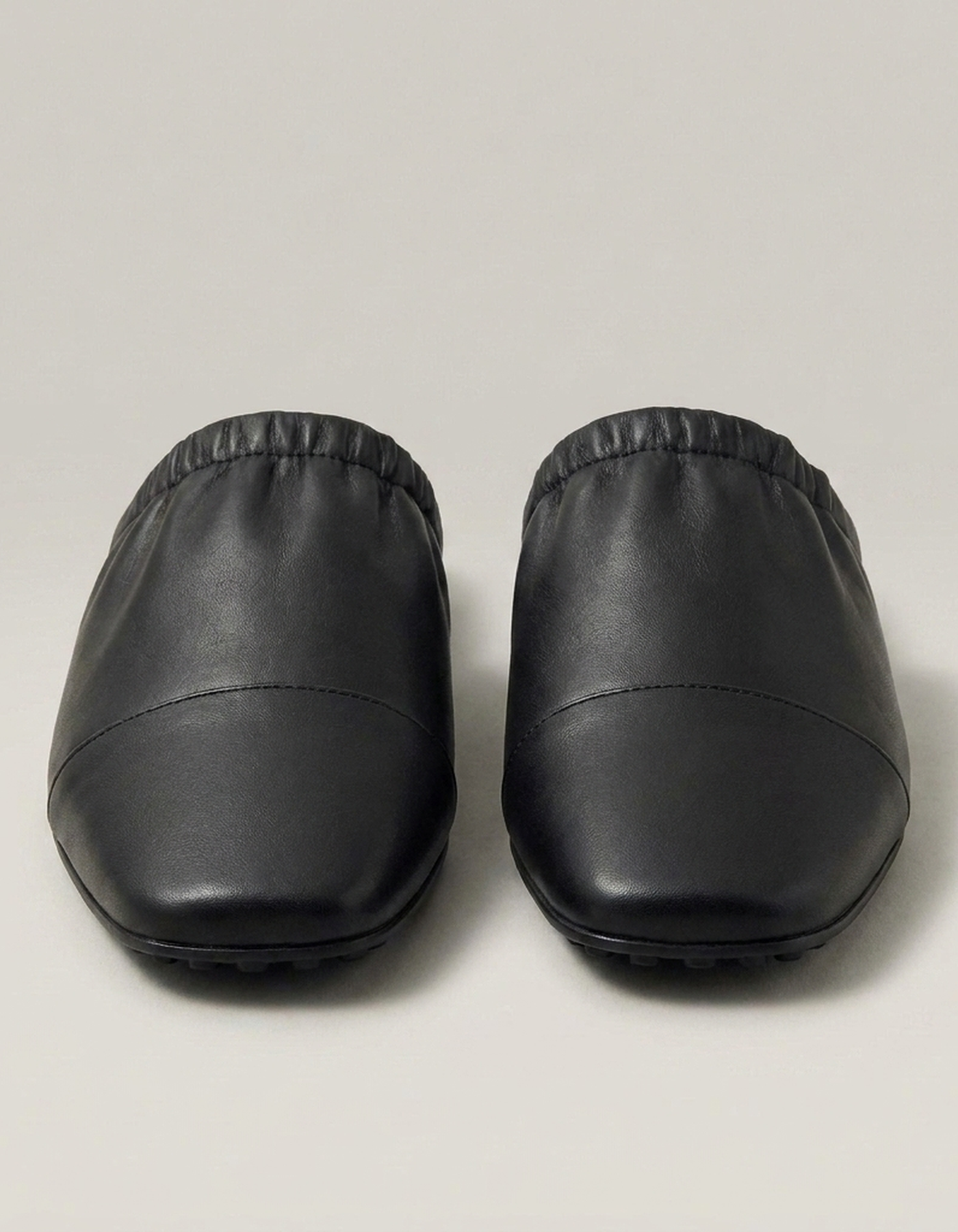 PLUXSTYLE::numise::womens-cap-toe-slip-on-mules::closeup-detail