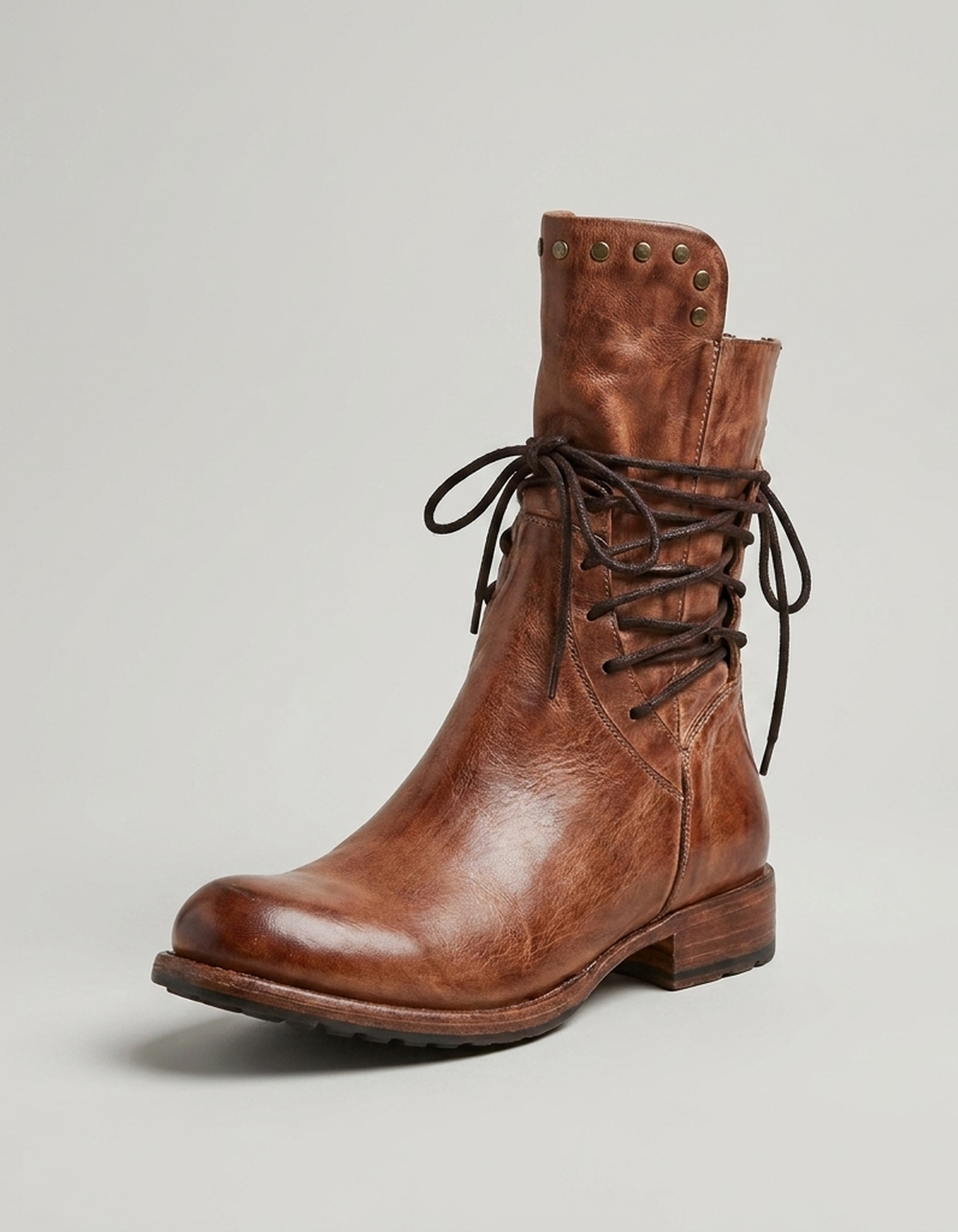 PLUXSTYLE::numise::studded-lace-up-ankle-boots::closeup-hero