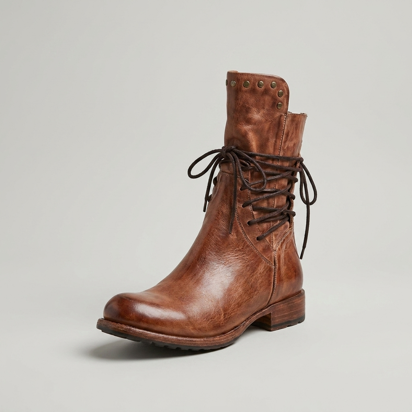 PLUXSTYLE::numise::studded-lace-up-ankle-boots::closeup-hero