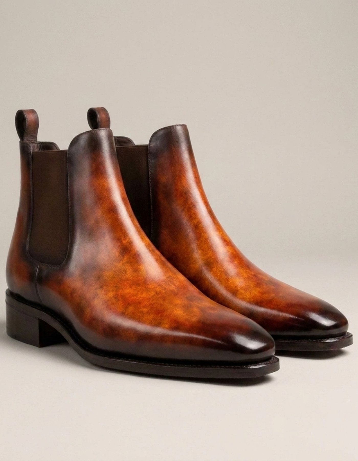 PLUXSTYLE::numise::mens-fire-orange-chelsea-boots::closeup-detail