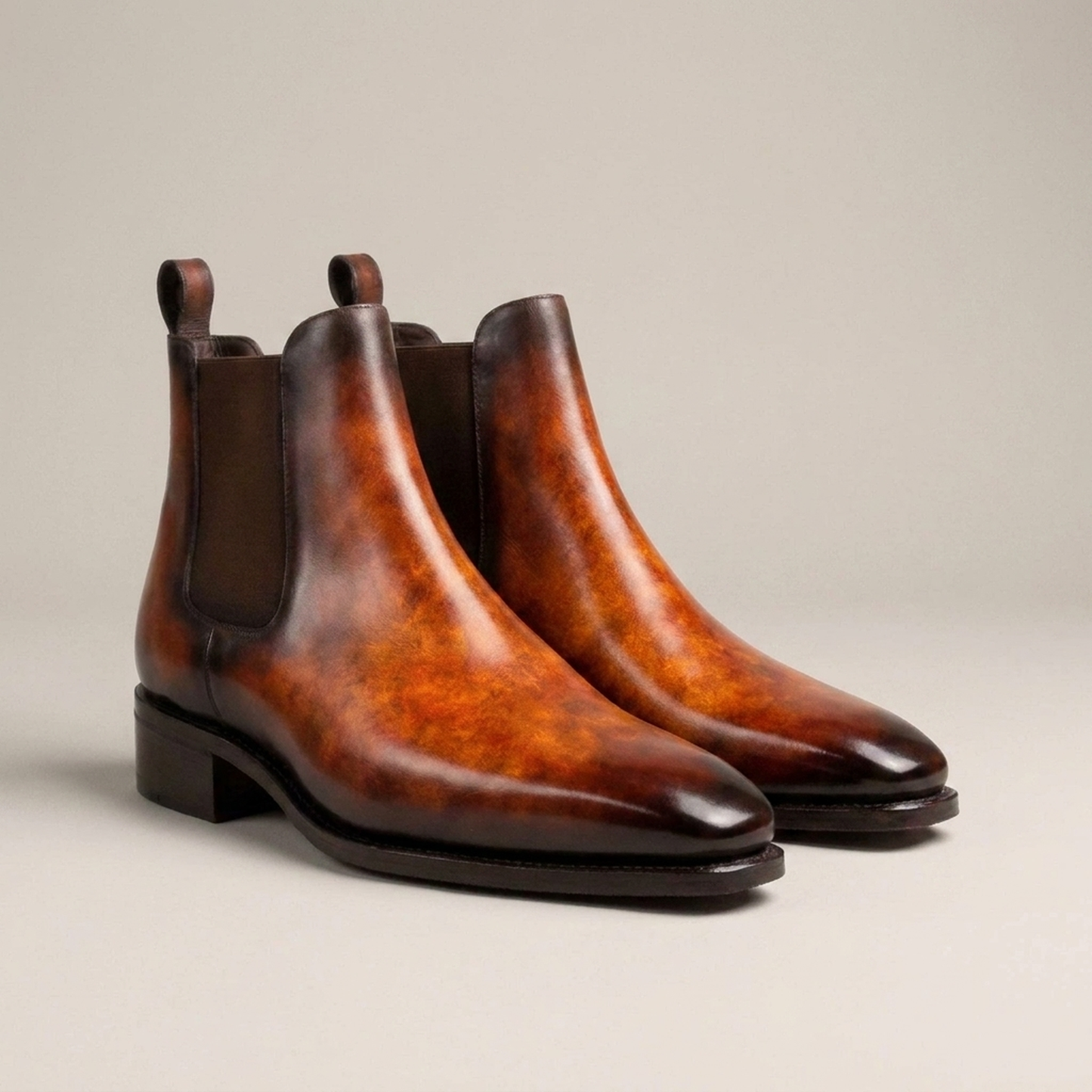 PLUXSTYLE::numise::mens-fire-orange-chelsea-boots::closeup-detail